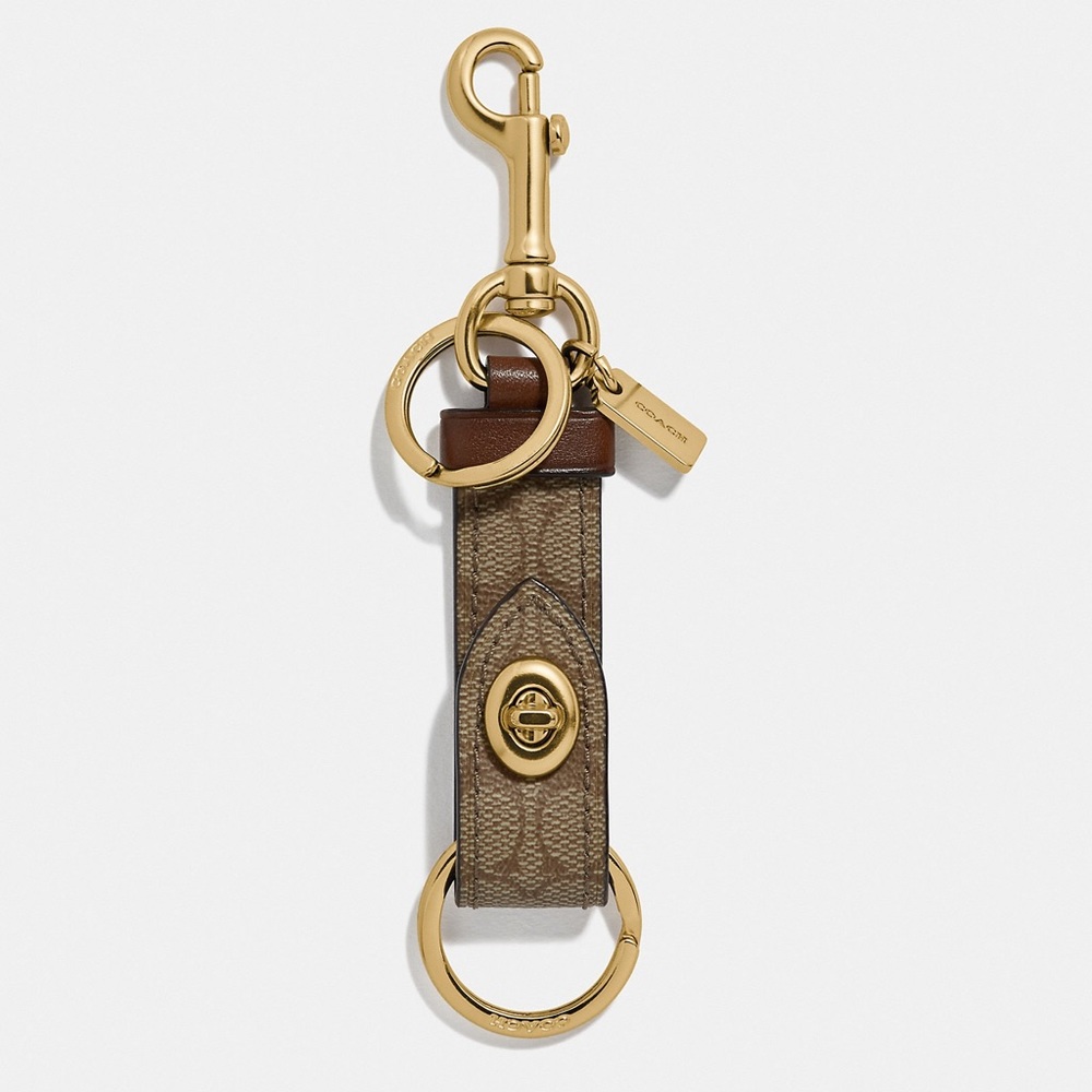 Coach Trigger Snap Bag Charm In Signature Canvas